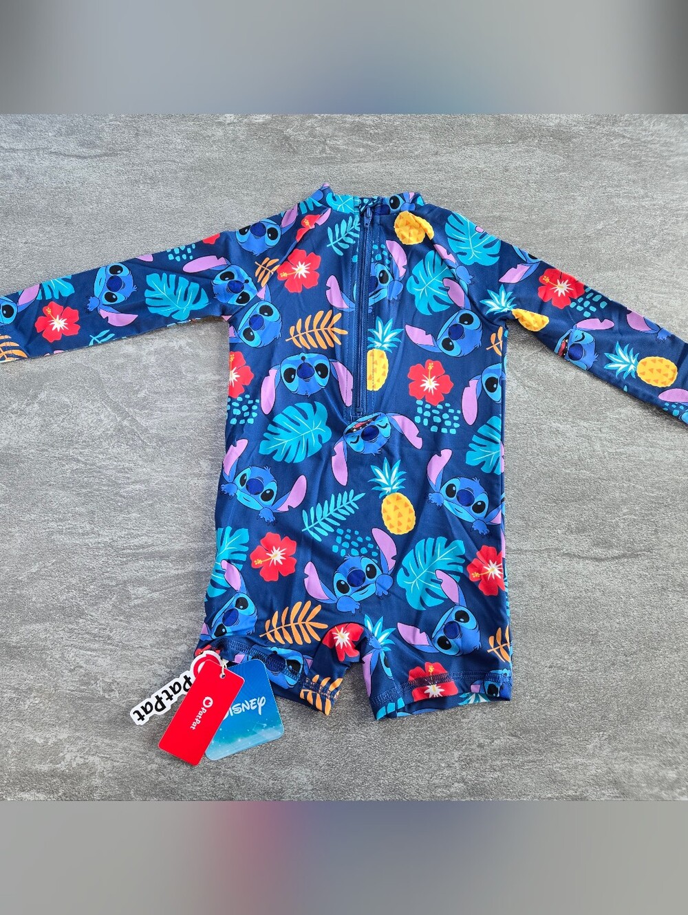 Disney Stitch Tropical One-Piece Rash Guard Swimsuit in size 9-12 months
